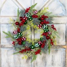 CHRISTMAS WREATH WITH ORNAMENTS AND BERRIES ON A TWIG BASE, 